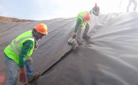 HDPE土工膜在渣场铺设的施工方案及协调措施-2